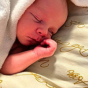 Ross joined the competition — help win amazing prizes! newborn, baby, sleeping, blanket, soft, face, hand, peaceful, rest, infant, closeup, skin, cute, cozy, portrait, bed, toddler, child, calm, warm