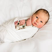 Wyatt joined the competition — help win amazing prizes! newborn, baby, swaddled, blanket, white, infant, cute, face, rosy_cheeks, lying_down, soft, peaceful, portrait, small_hands, sleepwear, bed, cozy, fresh, closeup, child