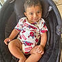 baby, child, infant, smile, marvel, spiderman, onesie, black_baby_seat, curly_hair, cushion, indoor, cute, happy, person, skin, foot, hand, light, seat, comfortable
