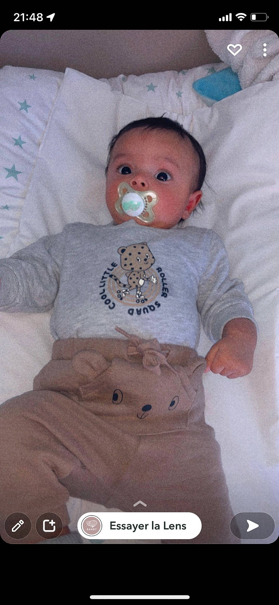 Kassim a rejoint le concours — aidez-le/la à gagner de superbes lots ! arm, baby, baby_products, baby_sleeping, baby_toddler_clothing, cheek, child, comfort, face, head, human_body, linens, mouth, nose, person, pink, skin, sleeve, t_shirt, textile