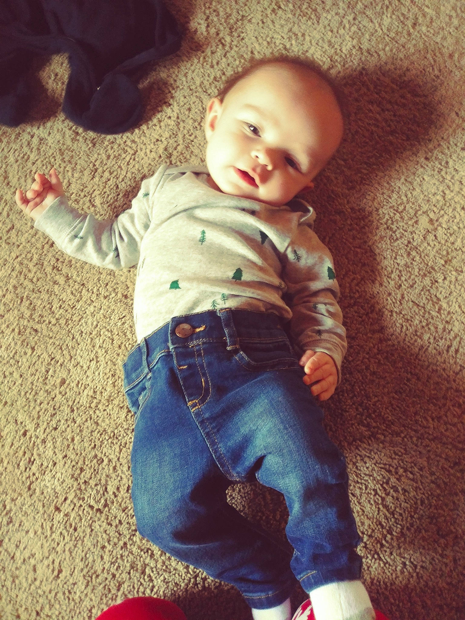 Kannon joined the competition — help win amazing prizes! baby_toddler_clothing, clothing, comfort, face, finger, floor, gesture, happy, head, human_body, iris, jeans, leg, nose, person, photograph, shoe, skin, sleeve, smile