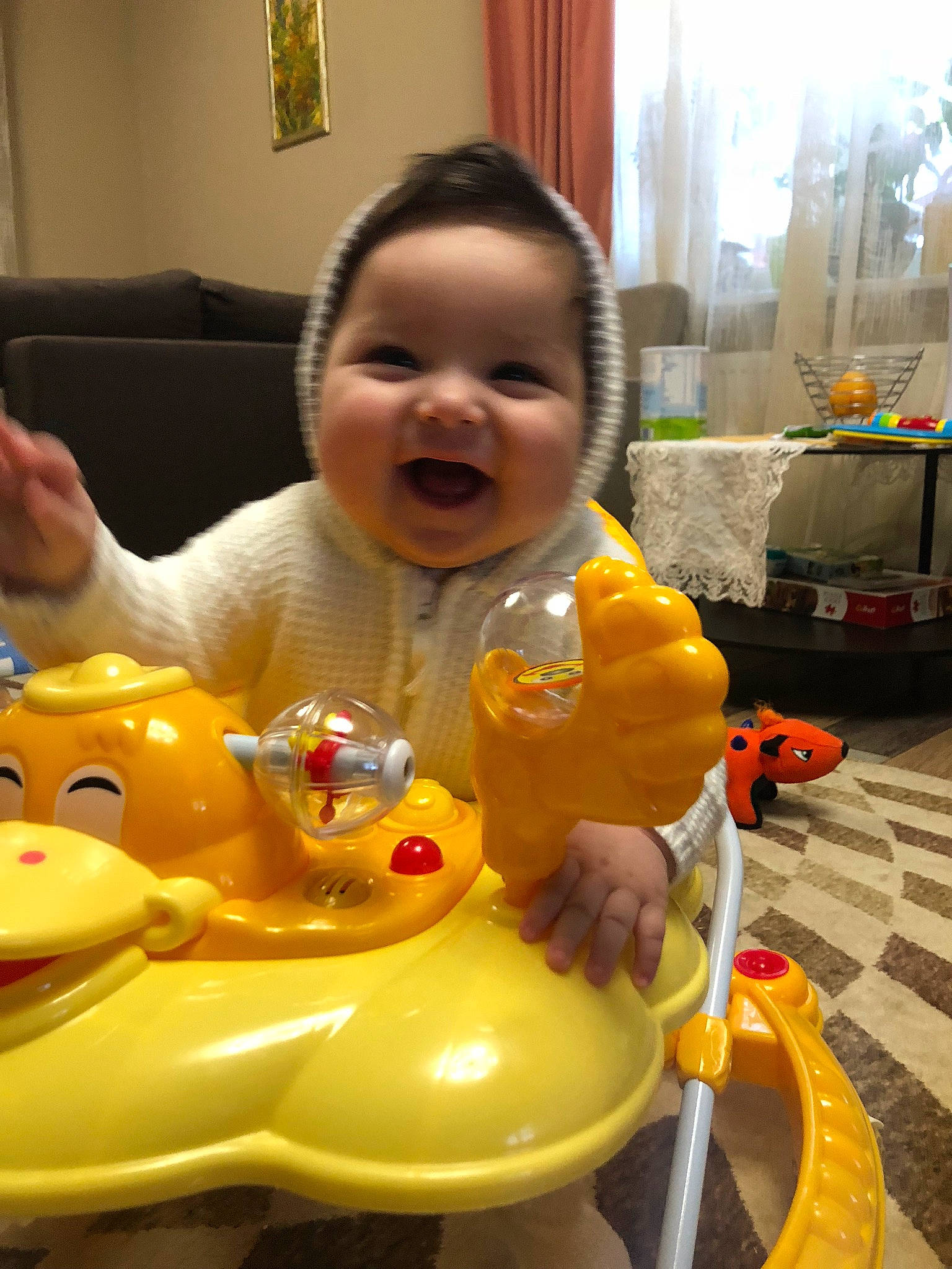 Aisha is registered to the contest to win money with this photo: baby, baby_toys, child, fun, person, play, toddler, toy, yellow