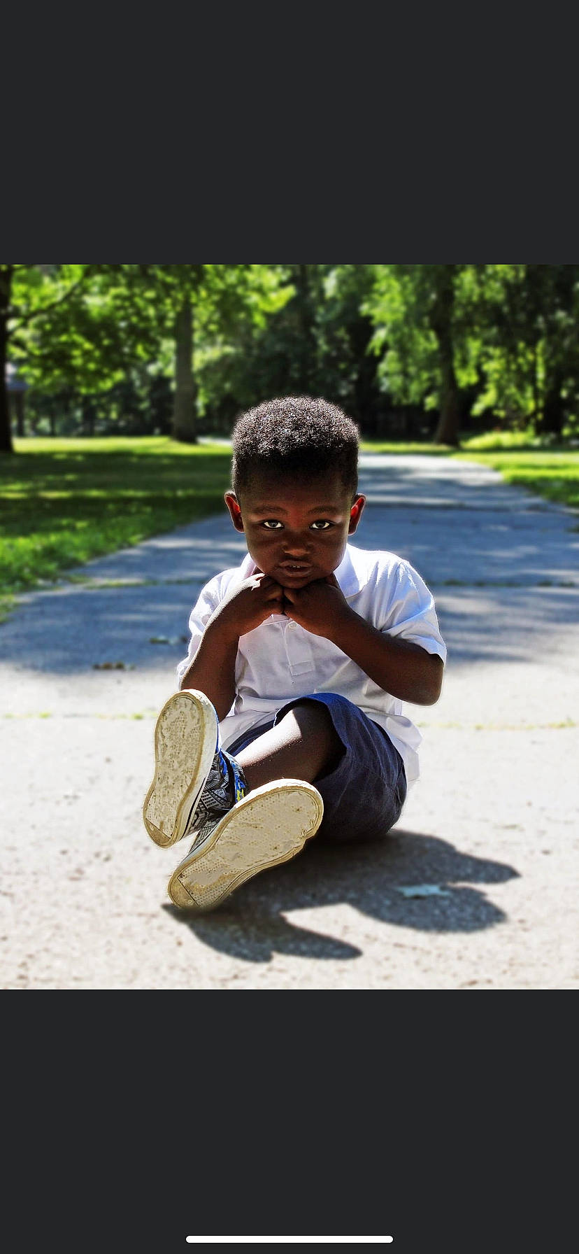 London joined the competition — help win amazing prizes! adaptation, child, footwear, person, photography, play, recreation, shoe, sitting, smile, toddler, vacation