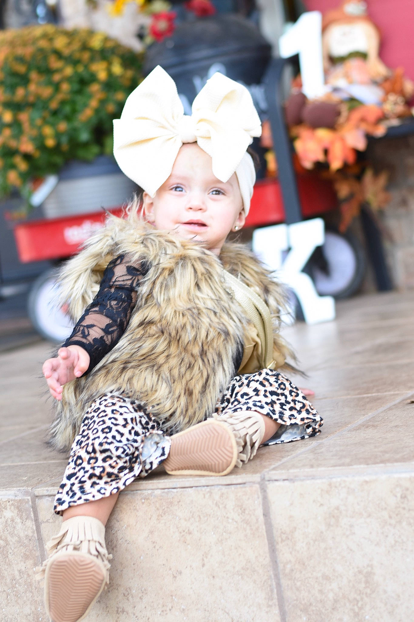 Kaizlee is registered to the contest to win money with this photo: baby, beauty, child, child_model, clothing, ear, fashion, fashion_accessory, footwear, fur, head, headgear, joint, outerwear, person, photography, shoe, shoulder, snapshot, street_fashion
