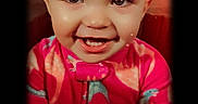 Hazel is registered to the contest to win money with this photo: toddler, child, smile, happy, face, portrait, onesie, pink_clothing, indoor, baby, cute, expression, vignette, colorful, young_child, eyebrows, cheeks, person, closeup, skin