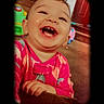 Hazel joined the competition — help win amazing prizes! baby, child, smiling, happy, indoors, pink_clothing, toy, face, laughing, infant, vignette, person, cute, cheerful, hands, home, carpet, door, playtime, joy