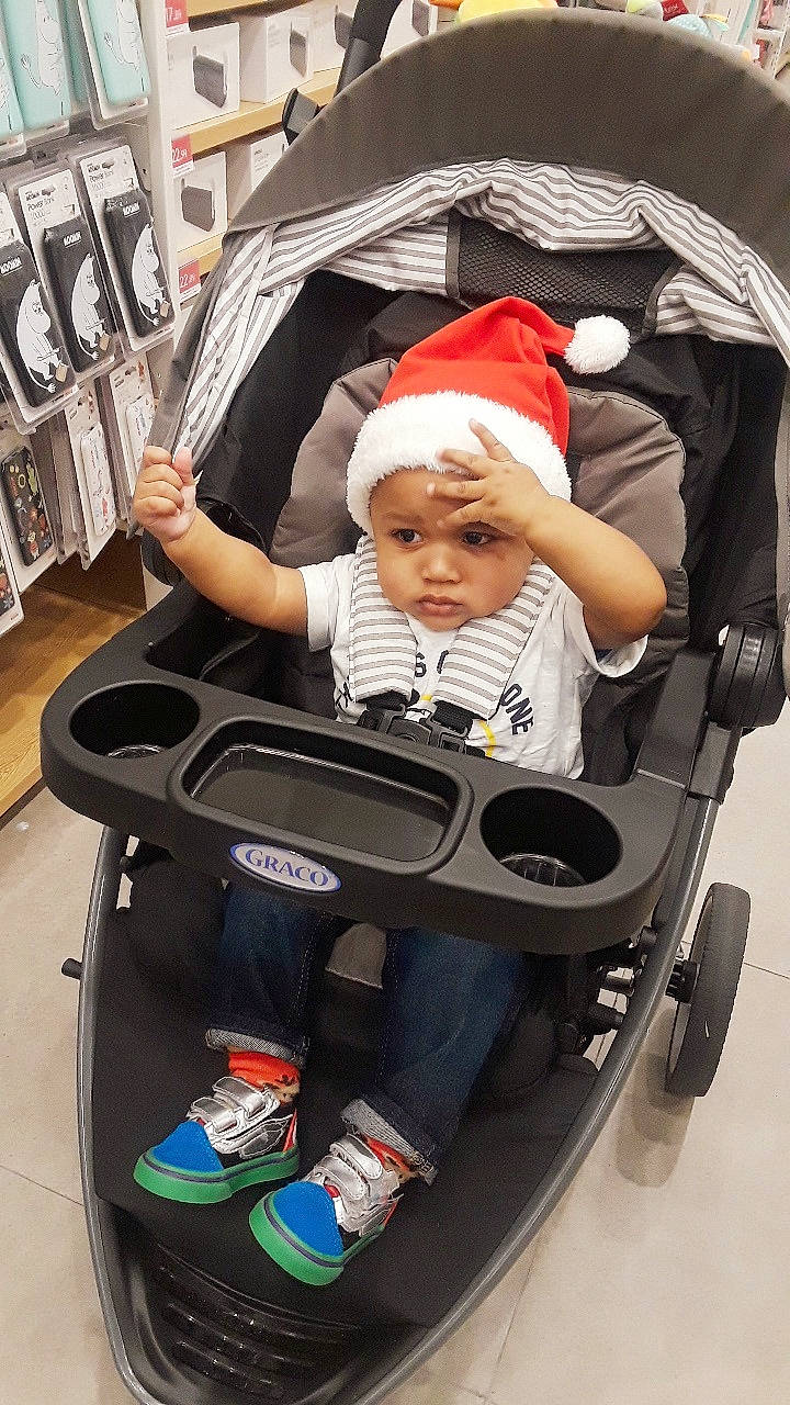 Deangelo is registered to the contest to win money with this photo: baby_carriage, baby_products, car_seat, child, headwear, lap, person, product, toddler, vehicle
