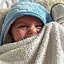 Bobby joined the competition — help win amazing prizes! baby, towel, blue_hood, face, eyes, blanket, soft_texture, cozy, infant, cute, smiling, closeup, child, indoors, warm, snuggly, portrait, happy, skin, head