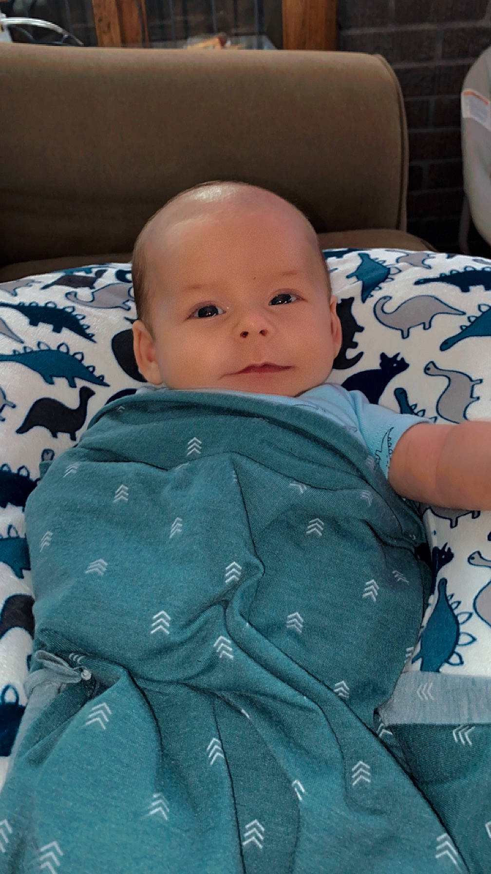 Joey is registered to the contest to win money with this photo: baby, baby_products, baby_sleeping, baby_toddler_clothing, bedding, cheek, child, comfort, electric_blue, linens, pattern, person, product, room, sitting, sleeve, smile, textile, toddler