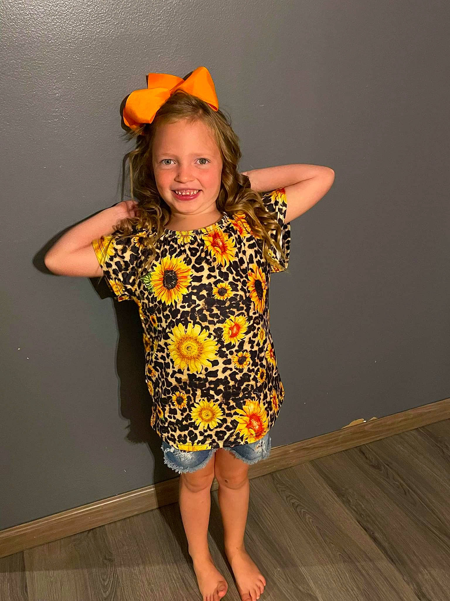 Maddalynn joined the competition — help win amazing prizes! baby_toddler_clothing, barefoot, face, facial_expression, fashion_design, finger, flash_photography, flooring, happy, hat, joint, joy, leg, one_piece_garment, orange, person, sleeve, smile, thigh, toddler