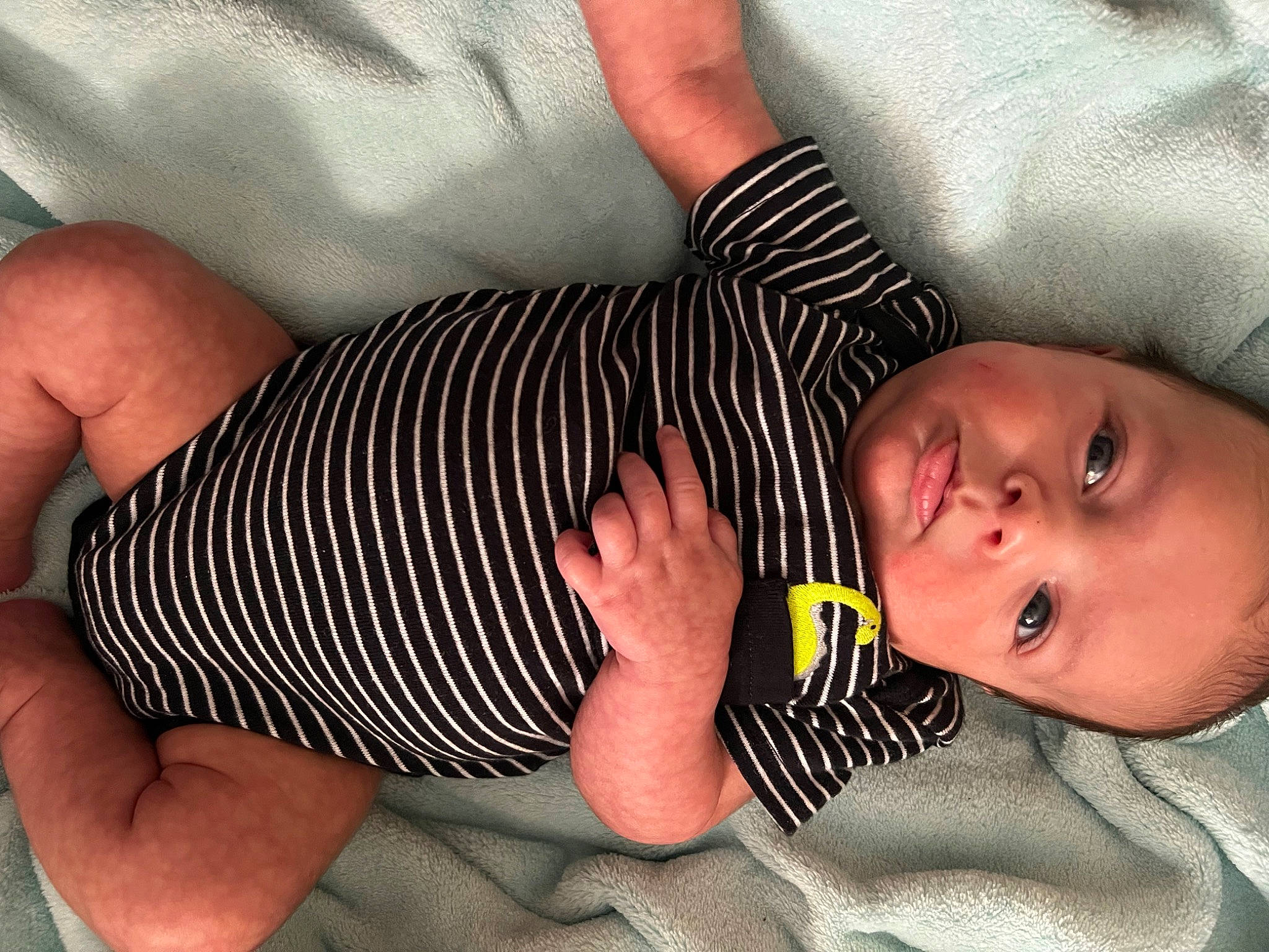 Colten joined the competition — help win amazing prizes! baby, baby_products, baby_sleeping, baby_toddler_clothing, cheek, child, comfort, eyelash, finger, foot, gesture, linens, nail, nose, pattern, person, sleeve, thigh, thumb, toddler