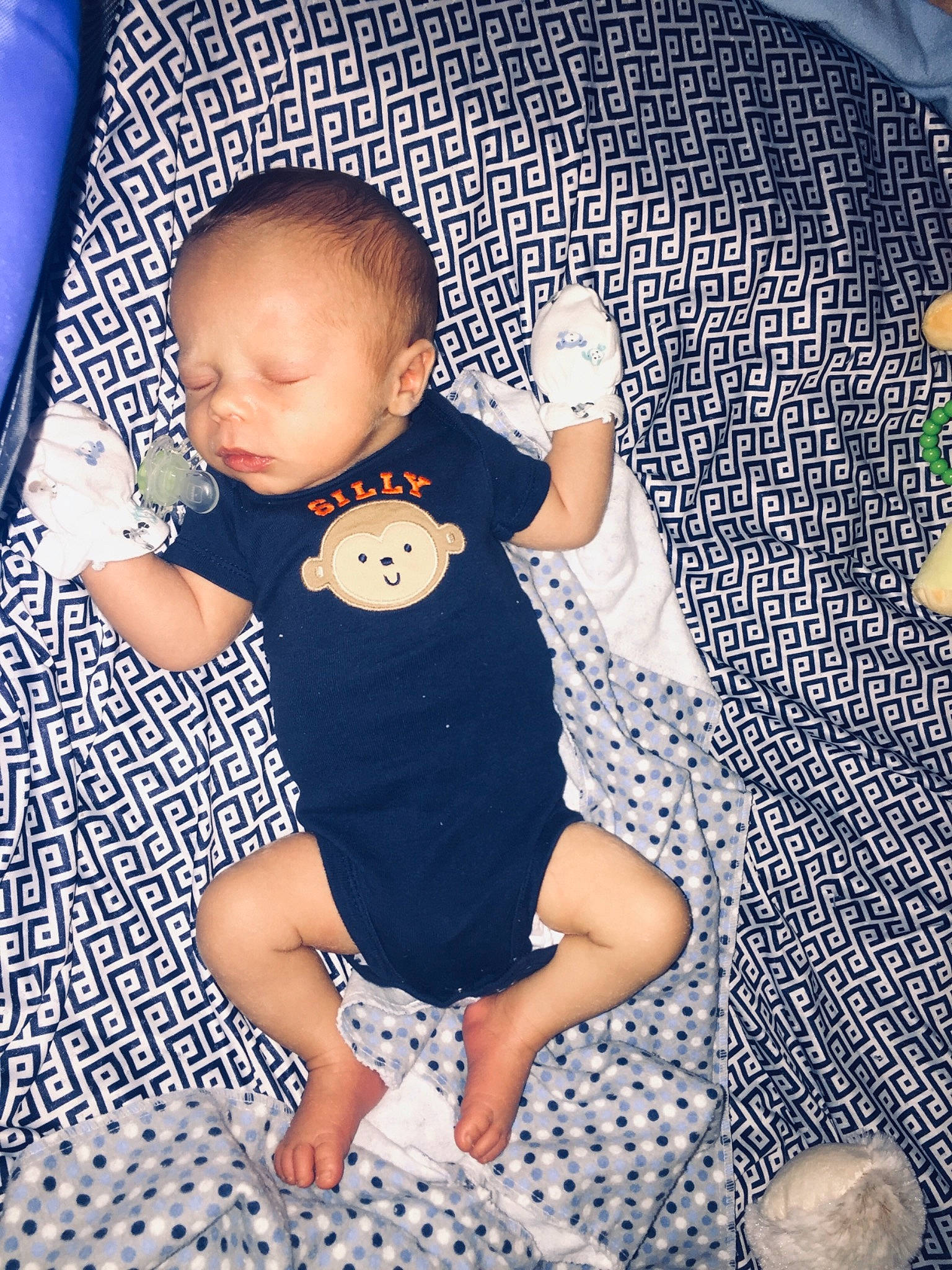 Jaxyn is registered to the contest to win money with this photo: baby, baby_products, baby_toddler_clothing, child, pattern, person, play, product, sitting, skin, smile, toddler