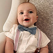 Bobby joined the competition — help win amazing prizes! accessories, baby, bowtie, chair, clothing, couch, face, formalwear, furniture, happy, head, jeans, pants, person, photography, portrait, shirt, strap, suspenders, tie