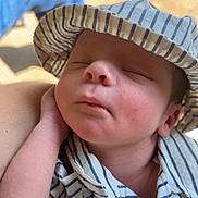 Dru joined the competition — help win amazing prizes! baby, sleeping, hat, striped_clothing, infant, peaceful, closeup, face, hand, newborn, skin, soft_light, portrait, resting, cute, child, casual, comfortable, outdoor, relaxation