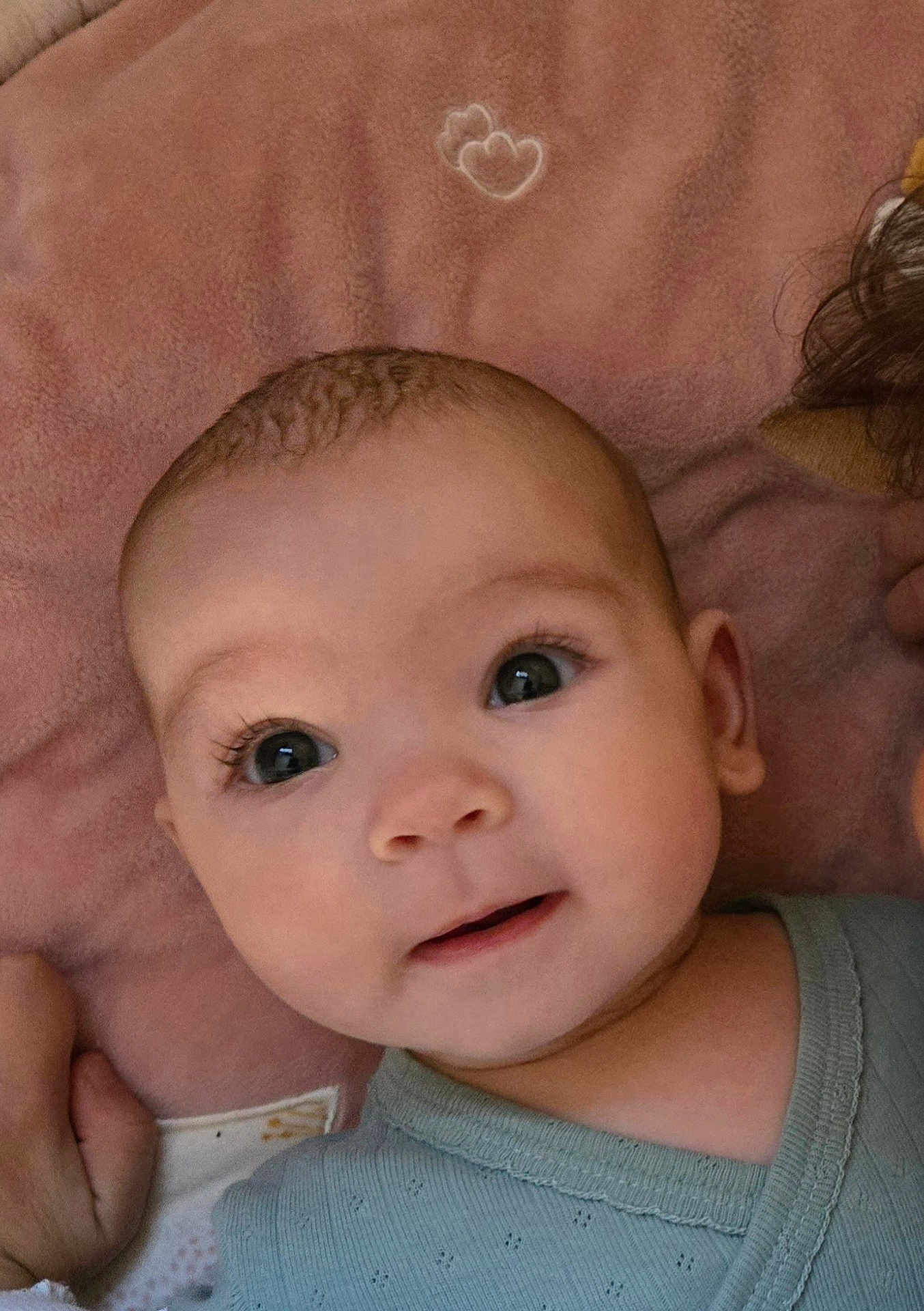 Lyna participe au concours pour gagner de l'argent avec cette photo : accessories, baby, blanket, clothing, cushion, earring, face, furniture, happy, head, homedecor, jewelry, newborn, person, photography, portrait, quilt, selfie, smile, t_shirt