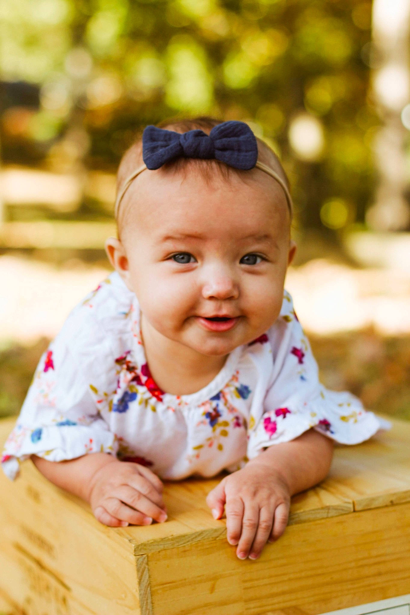 Elizabeth is registered to the contest to win money with this photo: baby, baby_toddler_clothing, child, eyewear, fun, goggles, grass, happy, hardwood, leisure, pattern, people_in_nature, person, photograph, portrait_photography, sitting, skin, smile, sunglasses, toddler