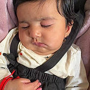 Aaira joined the competition — help win amazing prizes! baby, sleeping, car_seat, child, infant, face, hair, clothing, blanket, hand, peaceful, cute, safety_strap, indoors, closeup, portrait, soft, skin, young_child, resting
