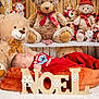 Arthur a rejoint le concours — aidez-le/la à gagner de superbes lots ! baby, sleeping, red_clothing, plush_toys, teddy_bears, holiday_decor, christmas, wooden_letters, noel, snowflakes, cushion, cozy, festive, soft_toys, indoor, child, holiday_theme, cute, decorations, portrait