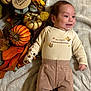 Francisco joined the competition — help win amazing prizes! baby, infant, smile, fall, autumn, pumpkin, thanksgiving, blanket, leaves, decoration, cozy, clothing, cute, holiday, milestone, wooden_sign, orange, brown, laying_down, happy
