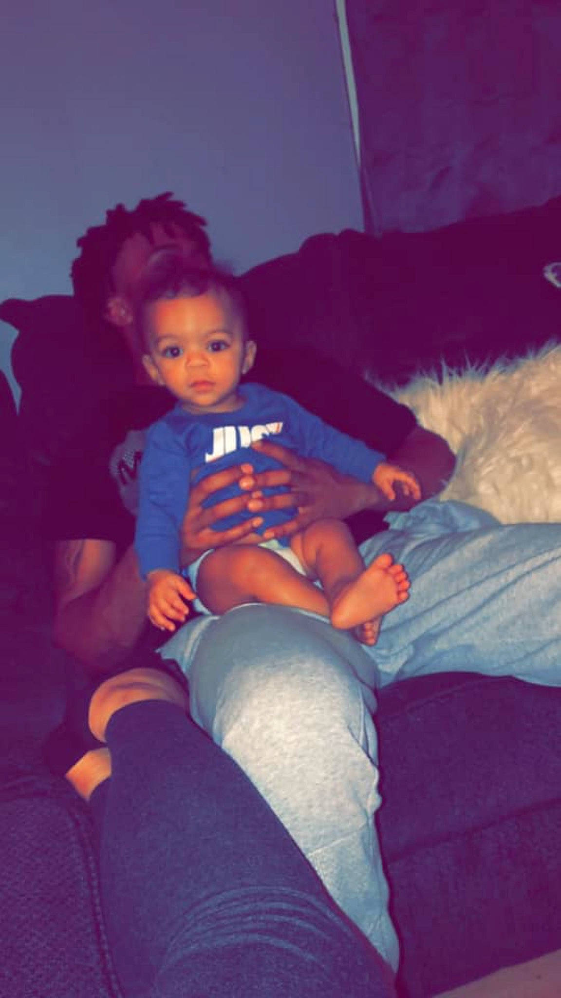 Judson is registered to the contest to win money with this photo: arm, baby, child, eye, fun, furniture, joint, lap, leg, person, pink, play, purple, sitting, skin, sleep, toddler, vacation