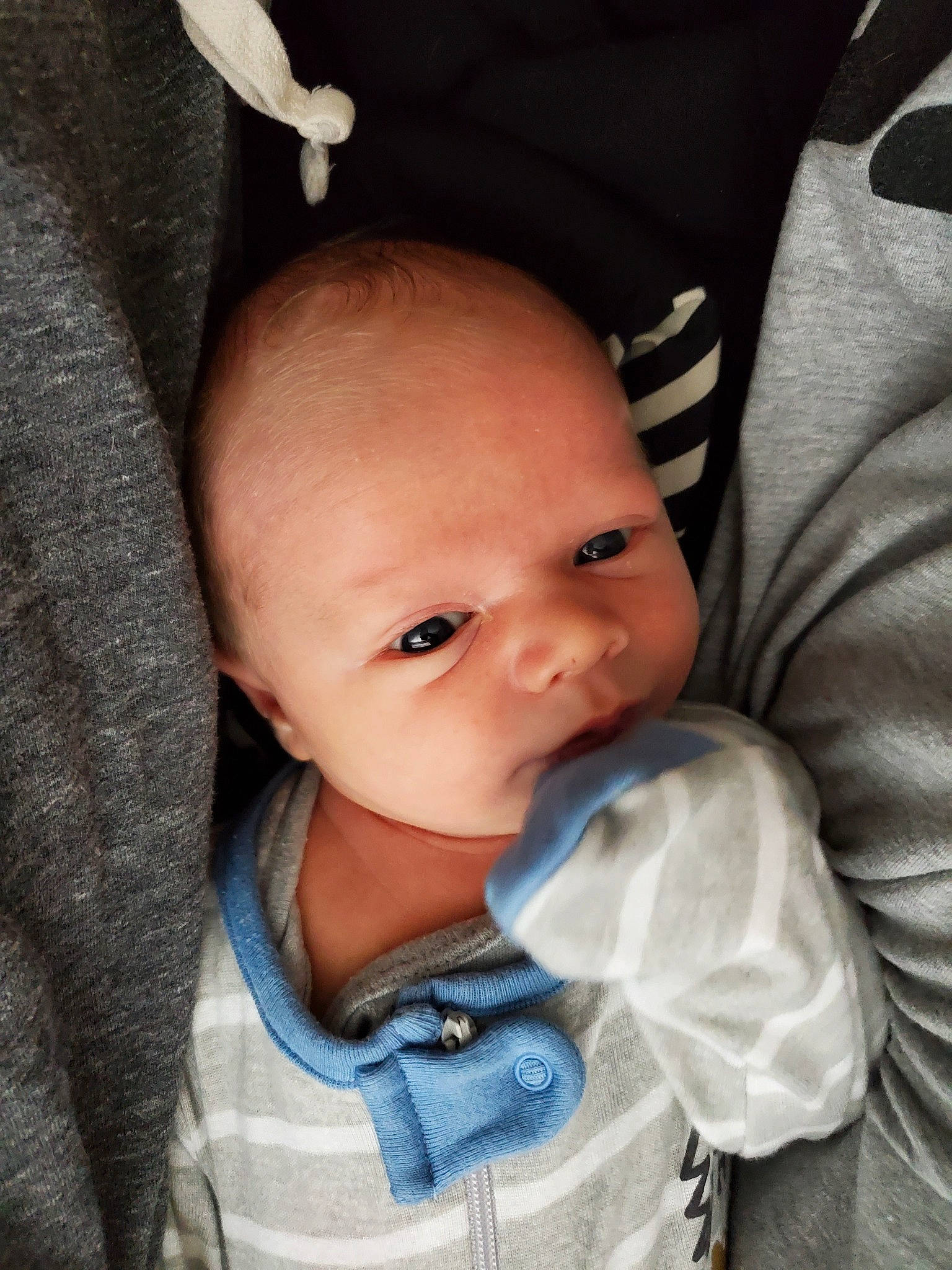 Bjorn is registered to the contest to win money with this photo: baby, baby_products, cheek, child, chin, ear, eye, face, finger, forehead, hand, head, iris, lip, mouth, nose, person, product, skin, smile