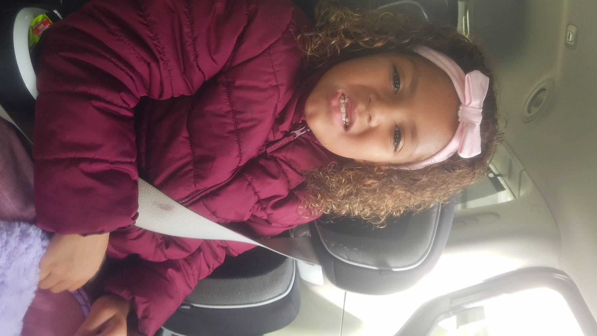 Ivanna joined the competition — help win amazing prizes! black_hair, brown_hair, cheek, child, comfort, ear, eyelash, eyewear, fun, happy, headwear, lip, long_hair, magenta, mouth, nose, person, pink, purple, sitting