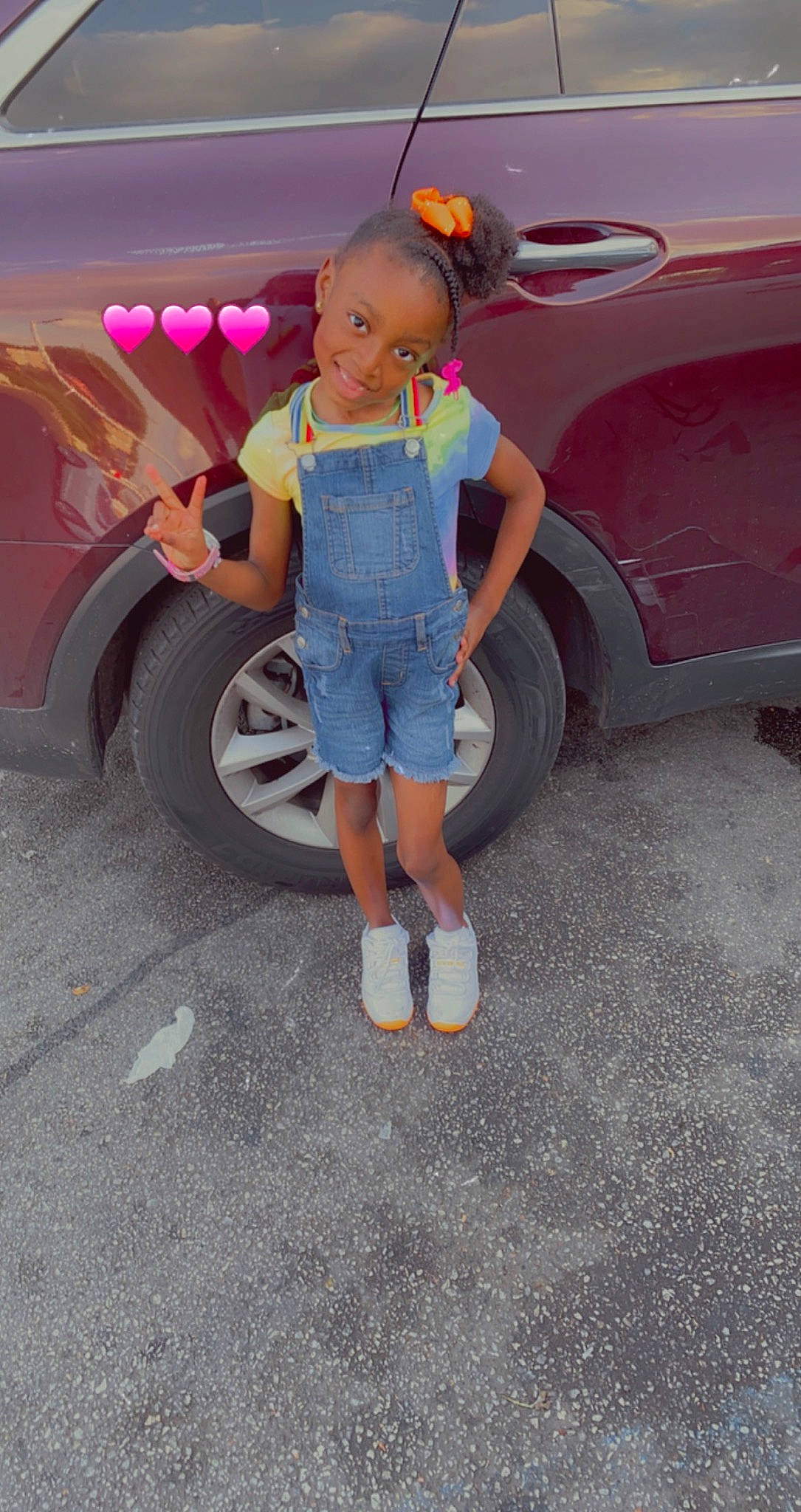 Ramiya Smith joined the competition — help win amazing prizes! automotive_design, automotive_exterior, automotive_lighting, automotive_tire, bumper, car, doll, fender, joy, knee, leg, motor_vehicle, person, rim, shorts, street_fashion, thigh, tire, toy, vehicle