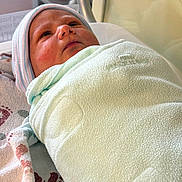 Meshi B joined the competition — help win amazing prizes! newborn, baby, swaddled, blanket, hospital, infant, hat, face, wrapped, bed, cute, sleeping, portrait, child, soft, cozy, resting, person, newborn_baby, hospital_bed