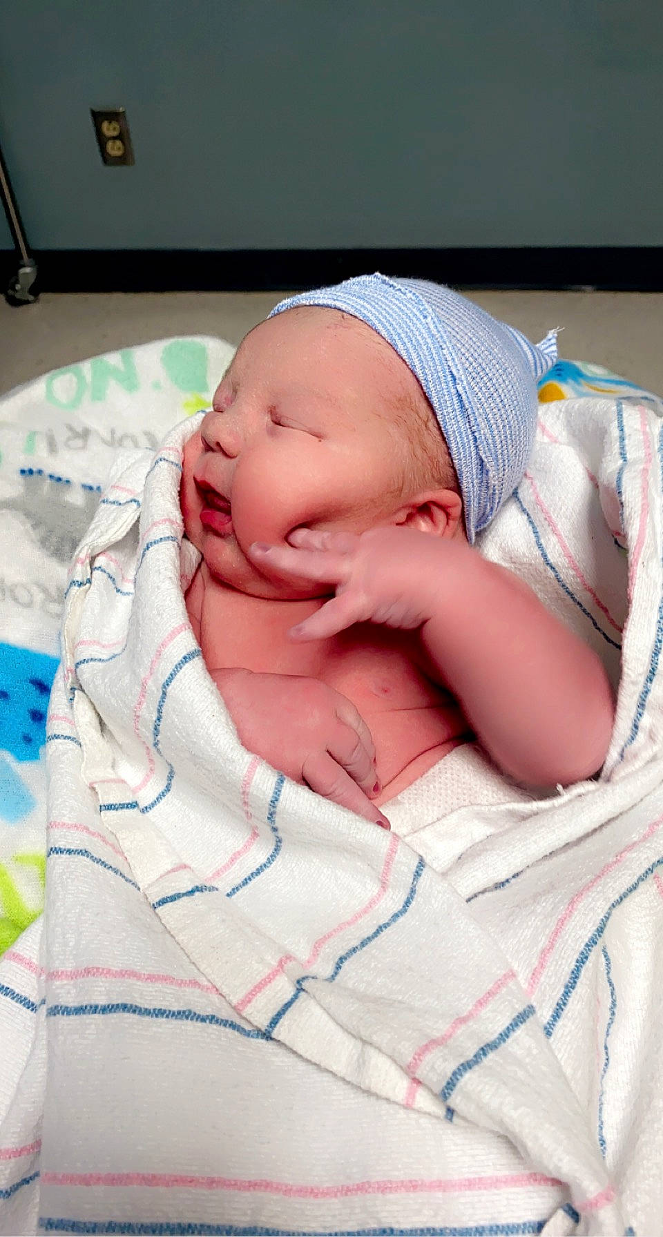 Wyatt is registered to the contest to win money with this photo: baby, baby_products, baby_sleeping, baby_toddler_clothing, beanie, bedtime, cap, cheek, child, childbirth, comfort, hand, hat, linens, mouth, nap, person, room, skin, sleep