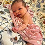 Oakleigh joined the competition — help win amazing prizes! arm, baby, bed, blanket, comfort, cute, face, floral_pattern, flower, hand, indoors, infant, lying_down, newborn, pink, portrait, skin, smiling, soft_texture, white