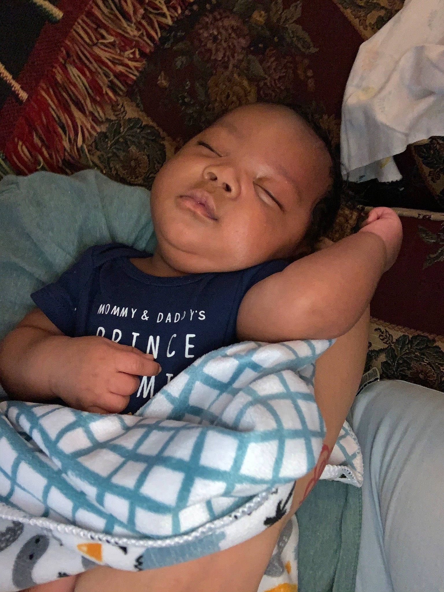 Kyland is registered to the contest to win money with this photo: arm, child, leg, person, sleep, smile, trunk