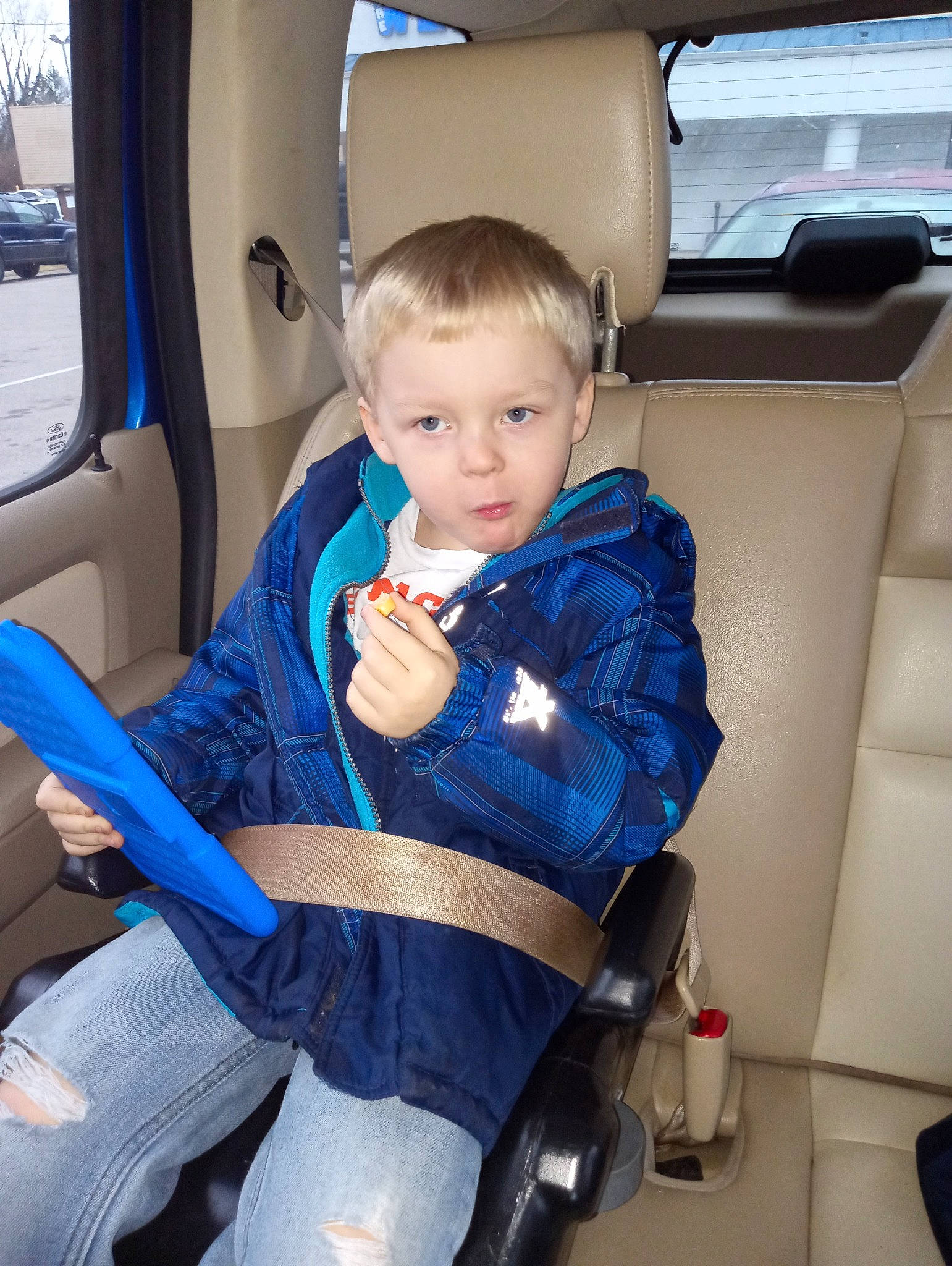 Wyatt joined the competition — help win amazing prizes! auto_part, automotive_design, automotive_exterior, car_seat, car_seat_cover, chair, child, comfort, electric_blue, family_car, head_restraint, lap, luxury_vehicle, mode_of_transport, motor_vehicle, person, seat_belt, sitting, toddler, vehicle