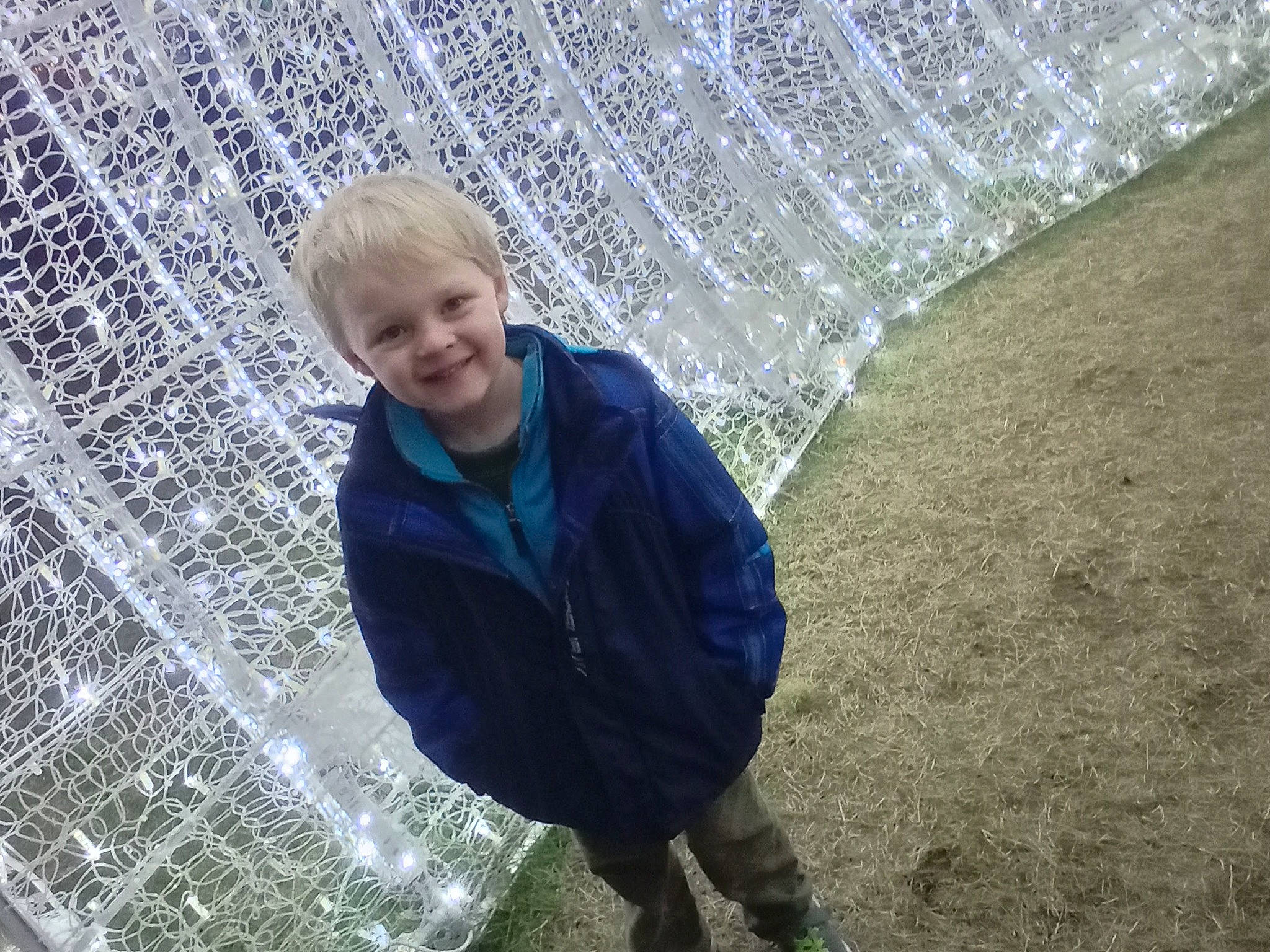 Wyatt joined the competition — help win amazing prizes! child, circle, electric_blue, fun, grass, happy, hoodie, joy, leisure, net, pattern, people_in_nature, person, play, reflection, road_surface, sitting, smile, soil, toddler