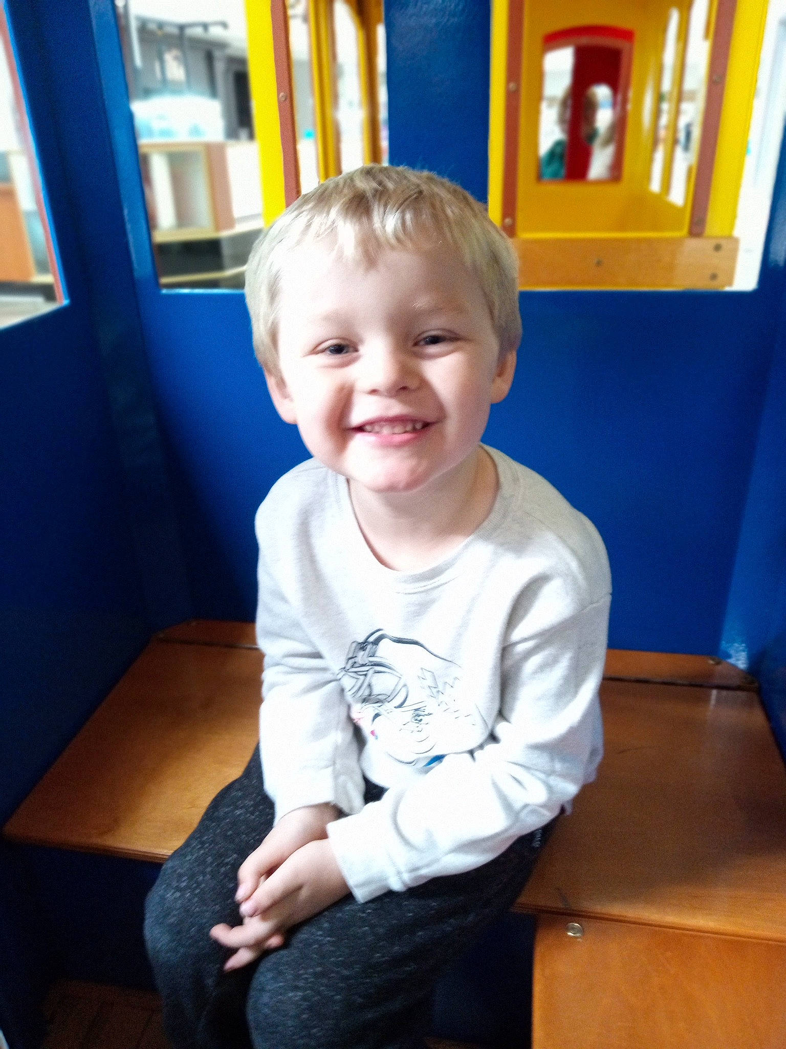 Wyatt is registered to the contest to win money with this photo: baby, baby_toddler_clothing, blue, child, chin, comfort, electric_blue, fun, happy, joy, laugh, leisure, person, room, sitting, sleeve, smile, standing, t_shirt, toddler