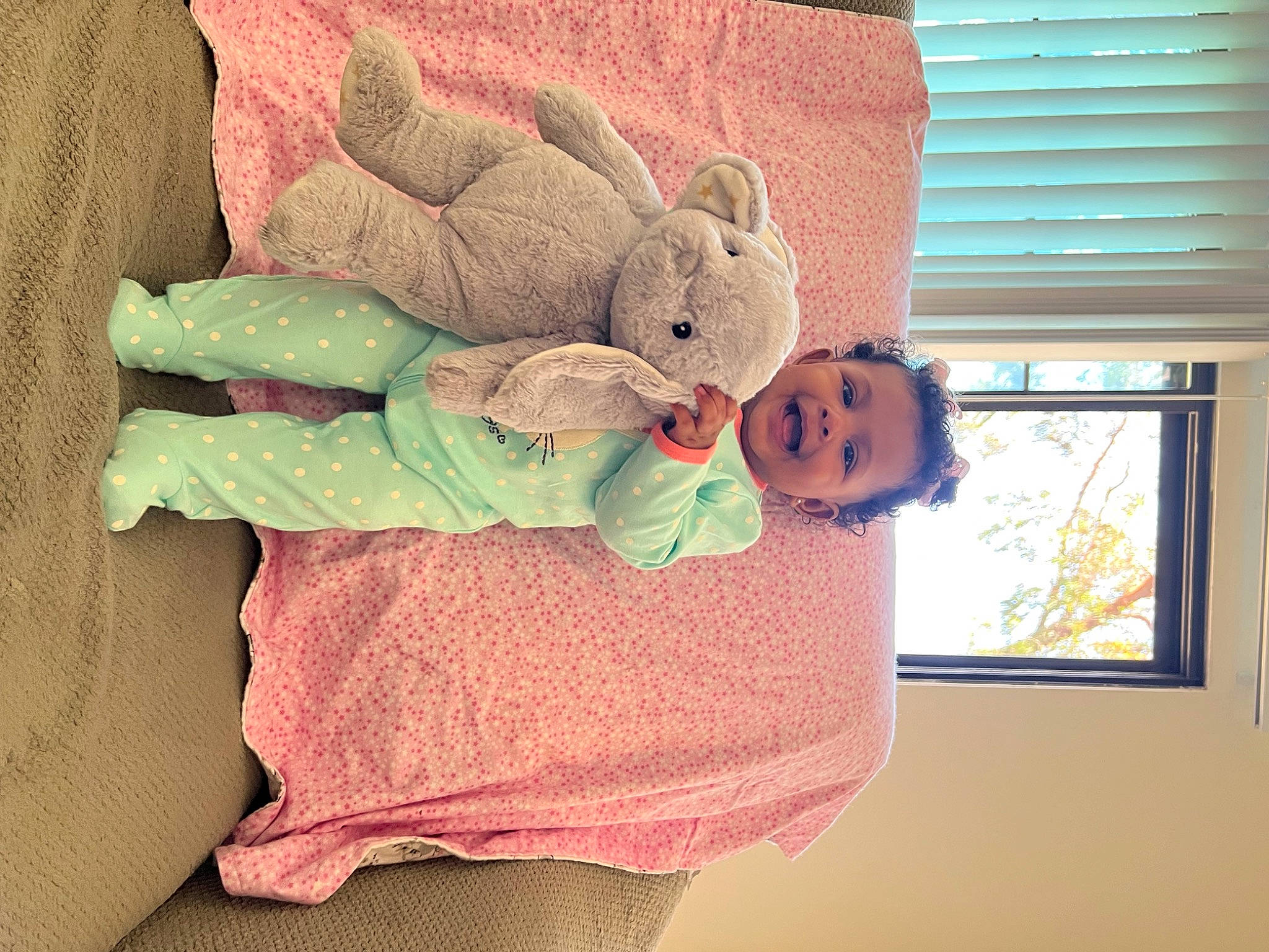 Kahlani is registered to the contest to win money with this photo: baby, baby_sleeping, child, comfort, eye, lap, linens, magenta, person, pink, plush, room, sitting, stuffed_toy, teddy_bear, textile, thigh, toy, window, window_blind