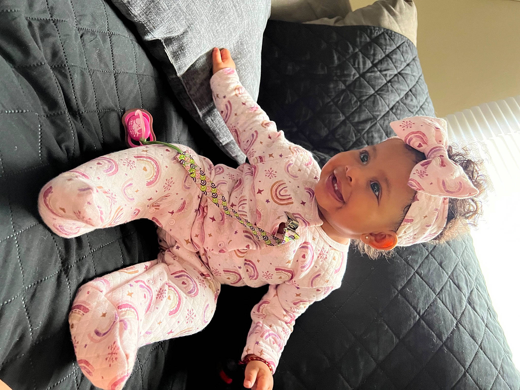 Kahlani joined the competition — help win amazing prizes! abdomen, baby, baby_toddler_clothing, barefoot, child, comfort, flesh, foot, gesture, happy, headwear, human_leg, joy, linens, person, pink, skin, sleeve, smile, textile