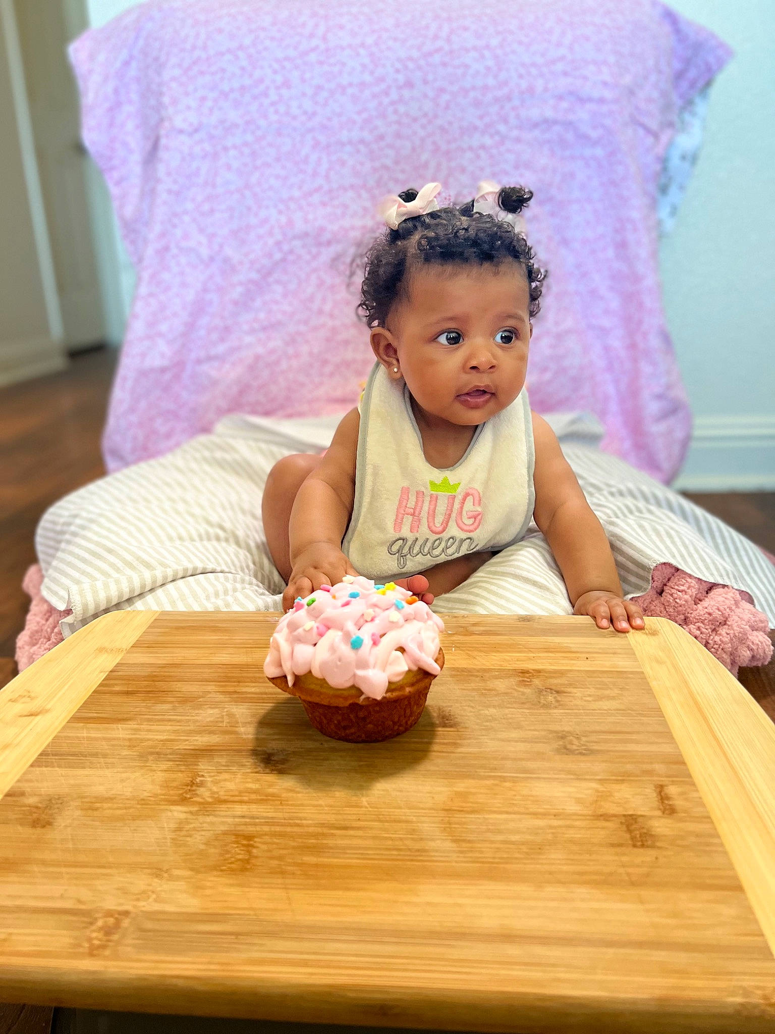 Kahlani joined the competition — help win amazing prizes! baby, baby_toddler_clothing, chair, child, comfort, desk, dress, finger, flooring, fun, hairstyle, happy, hardwood, person, pink, sitting, skin, table, tableware, toddler