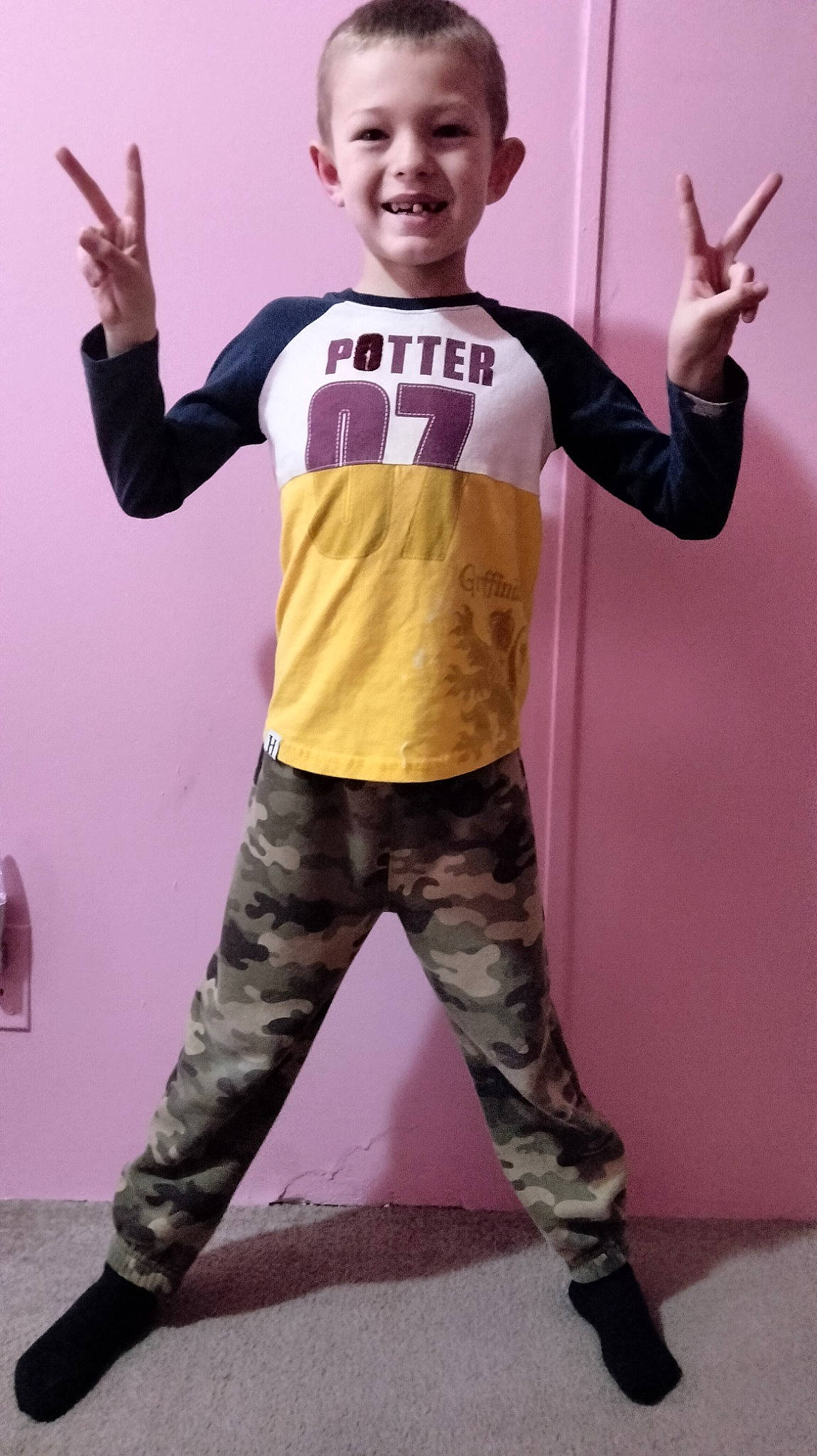 John joined the competition — help win amazing prizes! arm, clothing, cool, gesture, hairstyle, hand, happy, joint, joy, knee, magenta, person, purple, shoulder, sleeve, smile, sportswear, standing, t_shirt, thigh