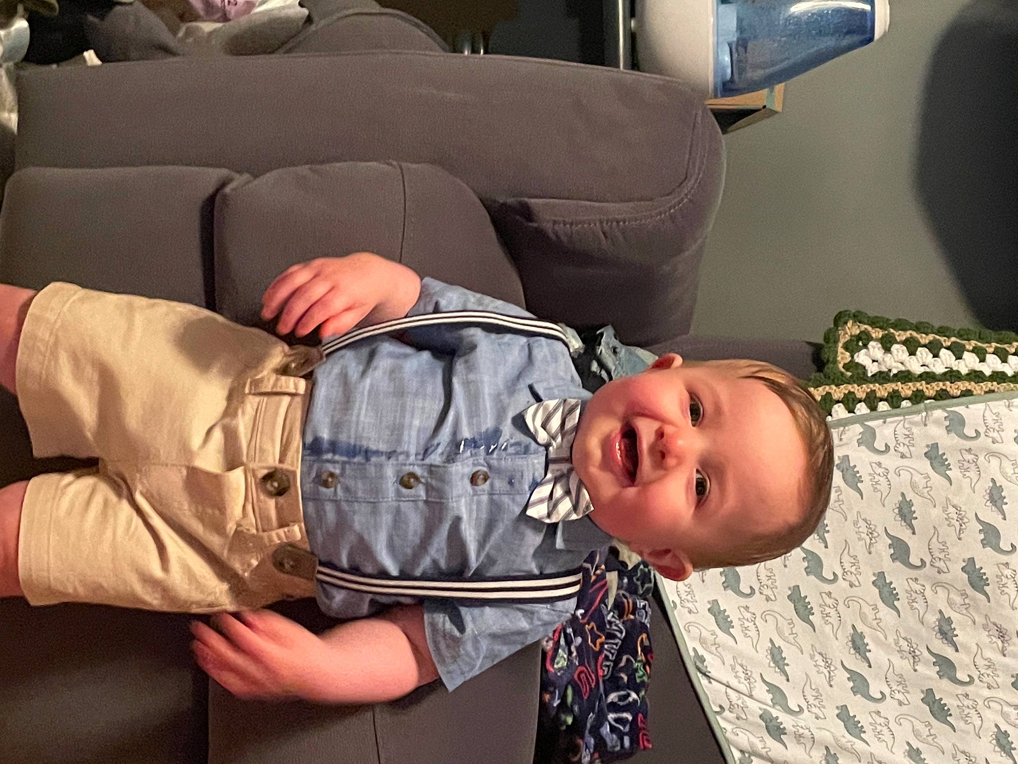 Mason is registered to the contest to win money with this photo: abdomen, baby, baby_products, baby_toddler_clothing, bag, child, comfort, family_car, finger, glasses, happy, interaction, joint, leg, luxury_vehicle, person, sitting, smile, sneakers, toddler