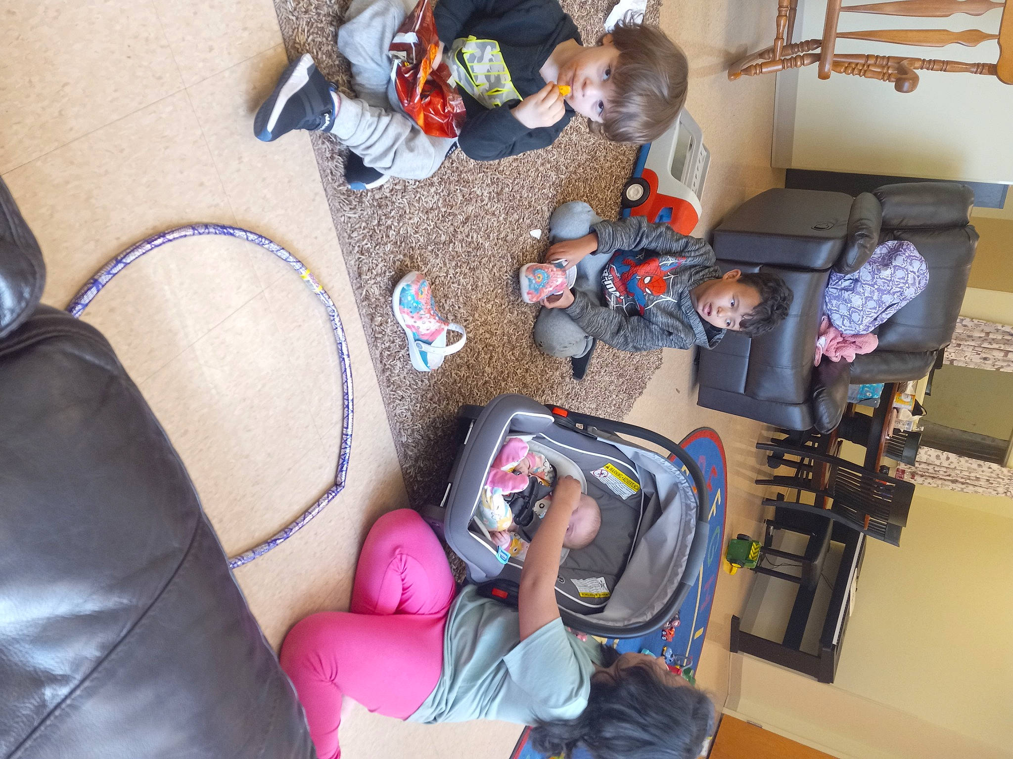 David joined the competition — help win amazing prizes! baby_products, bag, chair, child, comfort, couch, event, flooring, fun, hat, house, human_leg, lap, luggage_and_bags, person, room, sitting, sneakers, thigh, toddler