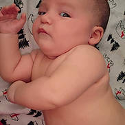 Stephen joined the competition — help win amazing prizes! arm, baby, blanket, child, chubby, cozy, cute, expression, face, indoors, infant, lying_down, pattern, pine_tree, polar_bear, portrait, resting, skin, warm, young