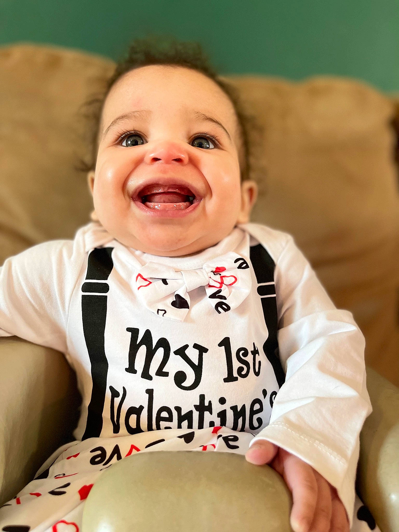 Kj is registered to the contest to win money with this photo: baby, baby_laughing, baby_toddler_clothing, cheek, child, chin, comfort, dishware, drinkware, eye, face, fun, happy, head, joy, person, serveware, skin, sleeve, smile