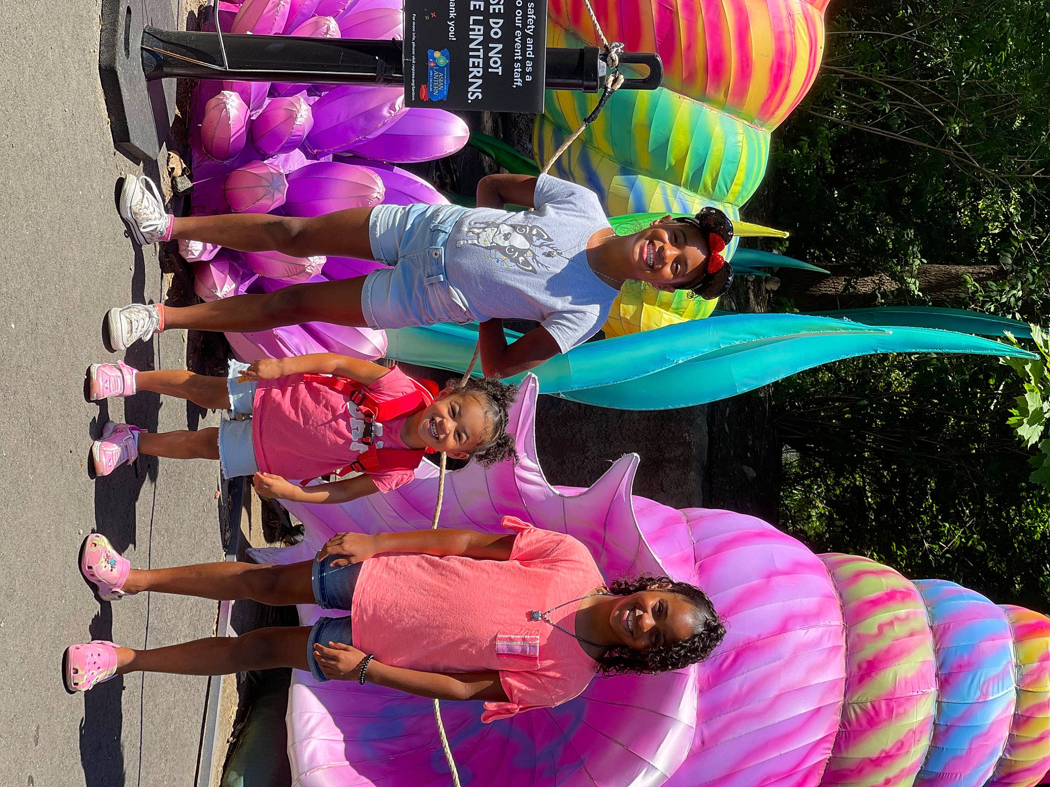 Naomi joined the competition — help win amazing prizes! balloon, event, fun, green, happy, hat, headwear, joy, leisure, magenta, organ, person, photograph, pink, purple, recreation, red, smile, snapshot, toy