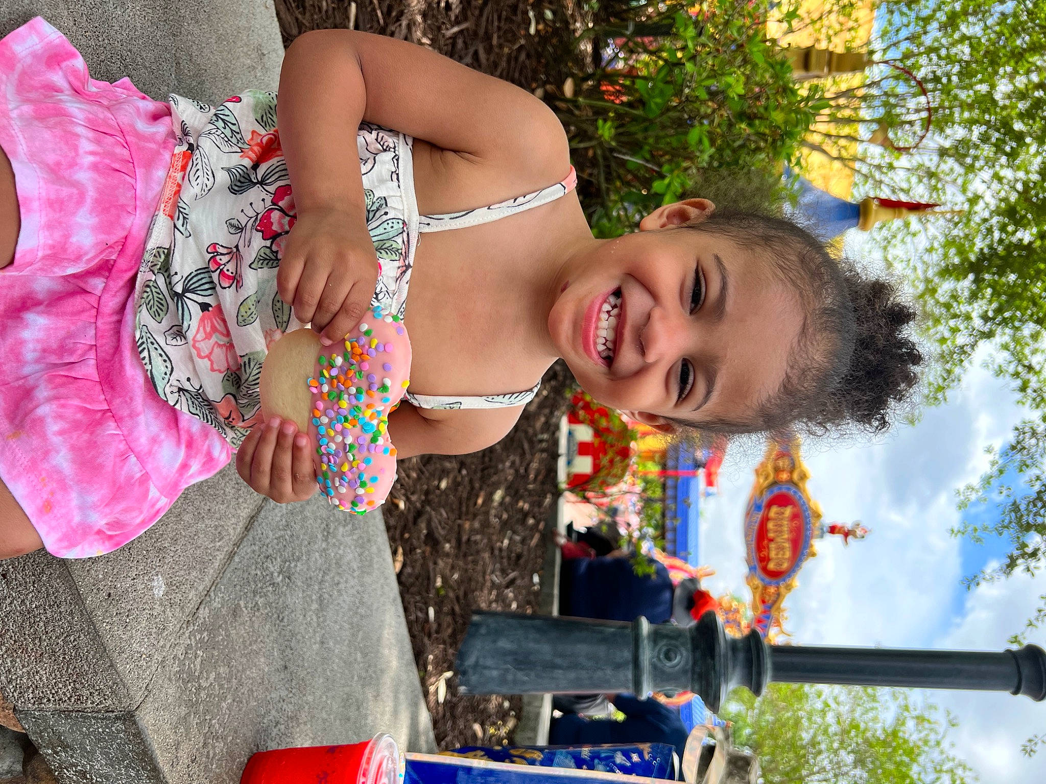 Naomi is registered to the contest to win money with this photo: abdomen, chest, child, event, fashion_accessory, fun, happy, human_leg, jewellery, joy, leisure, pattern, people_in_nature, person, recreation, smile, spring, thigh, toddler, tree