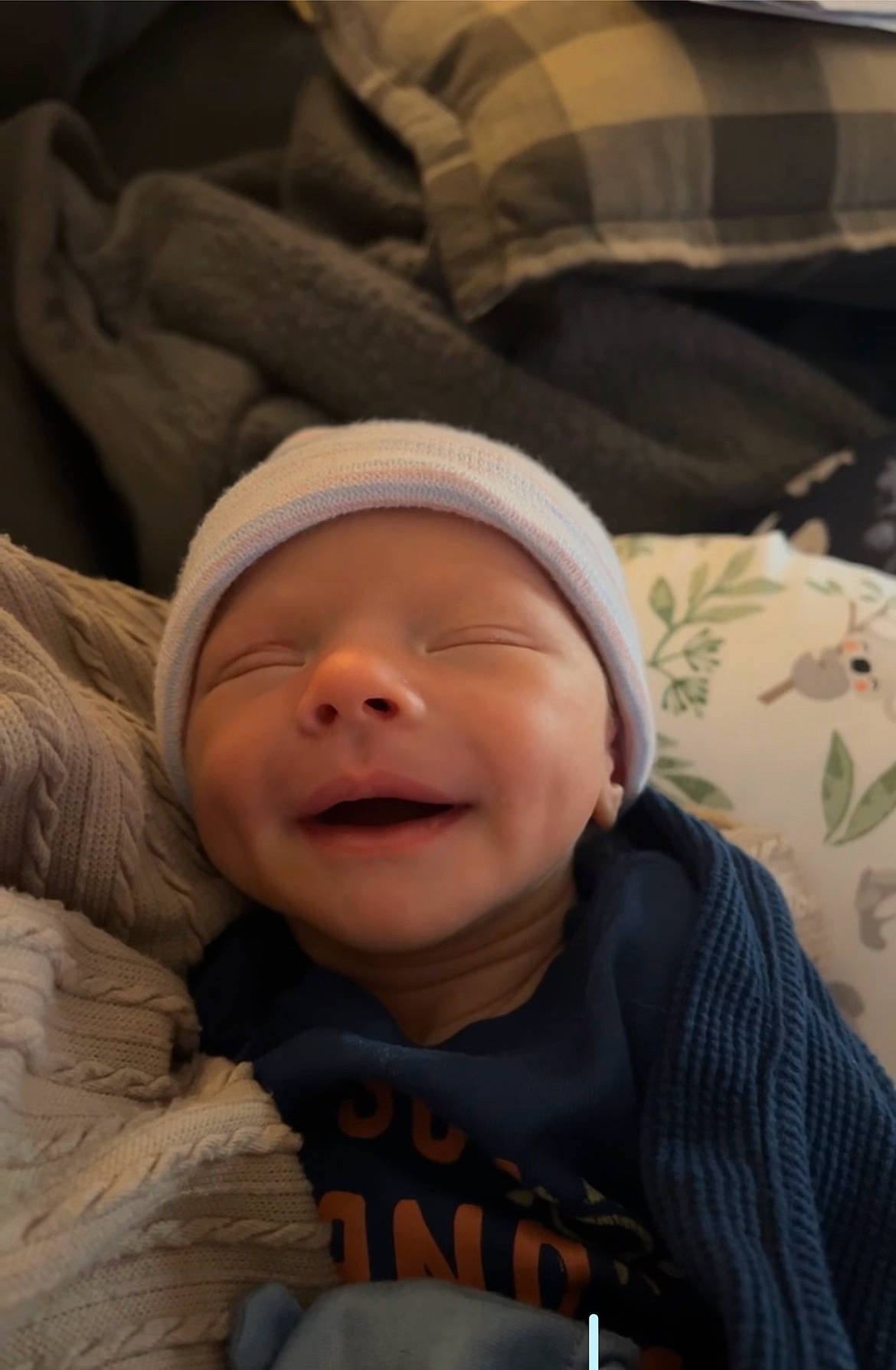 Braxton joined the competition — help win amazing prizes! baby, baby_products, baby_sleeping, baby_toddler_clothing, bedtime, cheek, child, comfort, facial_expression, fun, happy, linens, mouth, nose, person, sitting, skin, sleeve, smile, textile