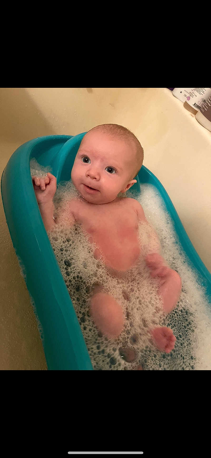 Weston joined the competition — help win amazing prizes! baby, bathtub, bubble_bath, water, foam, infant, child, skin, bathroom, cleaning, cute, relaxing, sitting, young, person, head, face, pink_skin, teal, bath