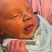 Mason joined the competition — help win amazing prizes! newborn, baby, infant, face, hand, tongue, skin, clothing, blue, closeup, expression, sleepy, cute, soft, resting, human, child, portrait, indoors, comfort