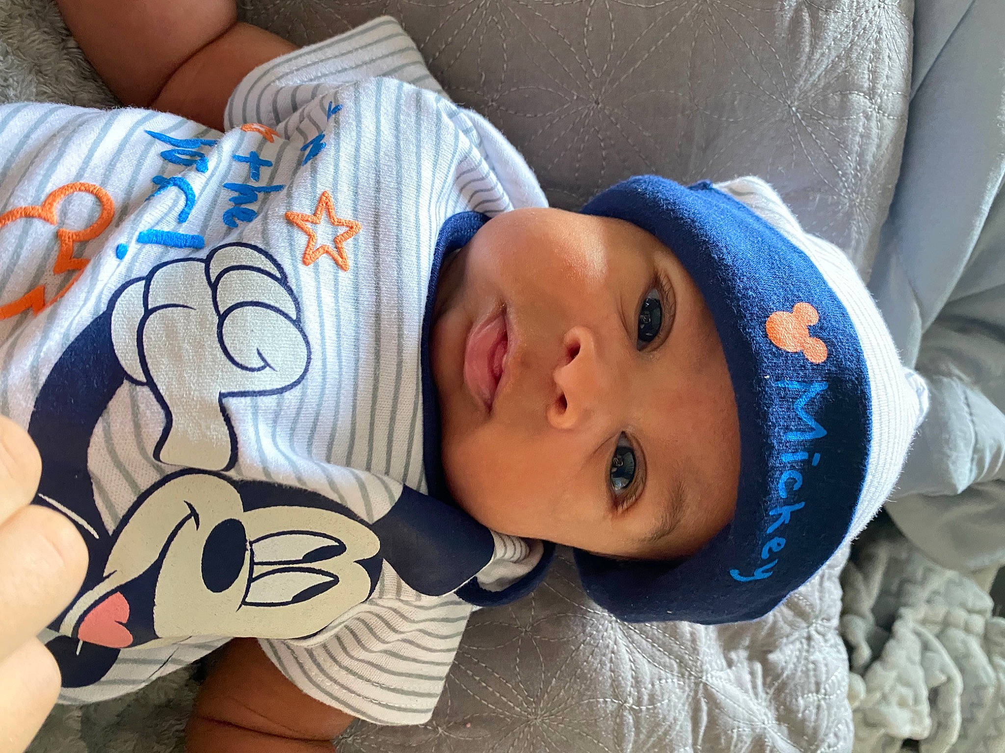 Kenzo is registered to the contest to win money with this photo: baby, baby_toddler_clothing, blue, cheek, child, chin, comfort, cool, eye, eyelash, face, happy, head, headgear, headwear, mouth, nose, organ, person, skin