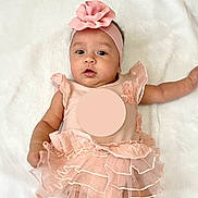 Claire joined the competition — help win amazing prizes! baby, infant, pink, headband, tutu, dress, ruffles, blanket, lying_down, cute, child, adorable, portrait, soft_texture, smiling, happy, skin, face, eyes, hands