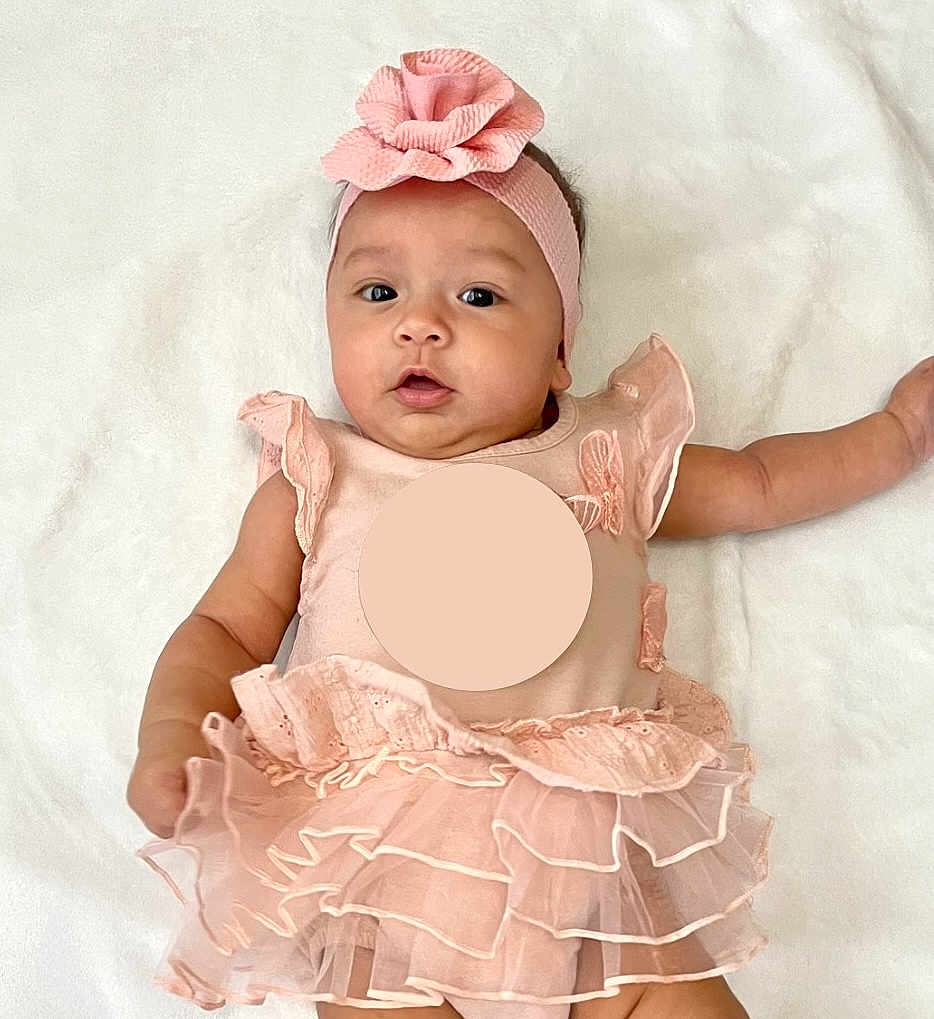 Claire joined the competition — help win amazing prizes! baby, infant, pink, headband, tutu, dress, ruffles, blanket, lying_down, cute, child, adorable, portrait, soft_texture, smiling, happy, skin, face, eyes, hands